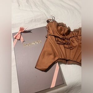 House of a CB Brown satin corset